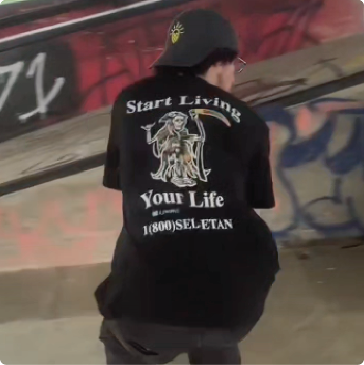 skylarskatesalot skateboarding in z black zdropped life your life t-shirt at a skatepark. 