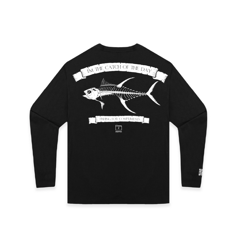 Rear view of a black unisex long sleeve with a large white tuna bones fish and 'catch of the day' text on a white background