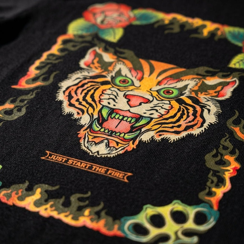 close up detailed shot of zdropped exotics youth t-shirt on a black garment